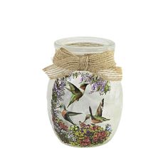 a glass jar with birds and flowers painted on the front, tied in twine