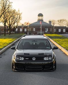 the car is parked on the side of the road