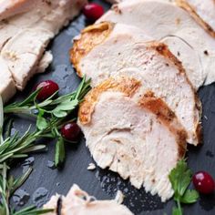 sliced turkey breast with cranberries and herbs