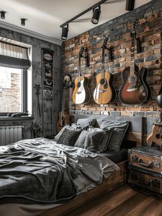 a bedroom with guitars hanging on the wall