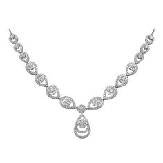 White Gold 14K Necklace Weight 13,62 Length 45 cm (adjustable) Diamond 10-Round-0,44ct-VVS 1 Diamond 6-Round-0,29ct-VVS 1 Diamond 60-Round-1,48ct-VVS 1 Diamond 283-Round-1,74ct-VVS 1 With a heritage of ancient fine Swiss jewelry traditions, NATKINA is a Geneva based jewellery brand, which creates modern jewellery masterpieces suitable for every day life. It is our honour to create fine jewelry, and it’s for that reason that we choose to only work with high-quality, enduring materials that can al Statement Collar Necklace, Silver Jewellery Sets, Engraved Bracelet, Teardrop Necklace, Engraved Necklace, Bridal Jewelry Sets, Bridal Necklace, Drop Necklace, Fine Jewellery