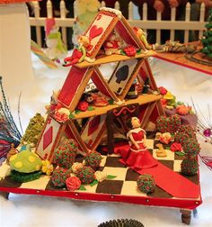 a gingerbread house made to look like it is going to be built in the shape of a christmas tree