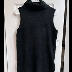 Brand New With Tag Saks Fifthe Avenue Sweater Size S Cozy And Very Comfortable Fabric. Trendy Black Top With Comfortable Fit, Trendy Black Cozy Fit Top, Cozy Stretch Black Tops, Fitted Sleeveless Black Sweater, Fitted Black Sleeveless Sweater, Black Fitted Sleeveless Sweater, Black High Neck Knit Top, Black Jacquard Knit Crew Neck Outerwear, S Crew