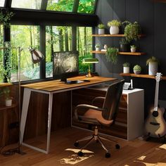 a computer desk sitting under a window next to a guitar and potted plant in front of it