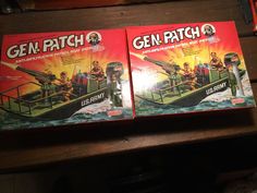 two boxed games are sitting on a table next to each other in the same box