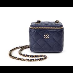 Chanel Quilted Navy Grained Calfskin Mini Vanity With Chain Gold Hardware Brand New With Tags Includes Authenticity Card, Dustbag, Care Card, Camellia Flower, And Box Navy Chanel Bag, Luxury Rectangular Bag With Pebbled Texture, Luxury Formal Bags With Pebbled Texture, Luxury Caviar Leather Evening Bag, Luxury Pebbled Leather Bag With Grained Texture, Luxury Rectangular Bag With Grained Texture, Designer Caviar Leather Bags For Formal Occasions, Luxury Business Bags With Pebbled Texture, Elegant Evening Bag With Pebbled Texture