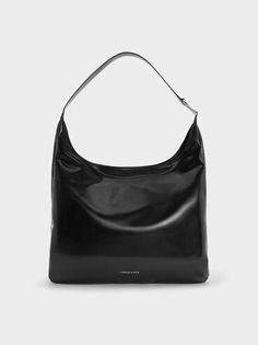 Noir Lumen Slouchy Hobo Bag | CHARLES & KEITH Laidback Aesthetic, Charles And Keith Bags, Charles And Keith, Slouchy Hobo Bag, Slouchy Tote, College Bags, Charles Keith, Everyday Outfit, Casual Black