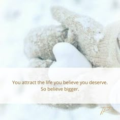 a teddy bear wearing a knitted hat and mittens with a quote on it that reads, you attract the life you believe you deserves