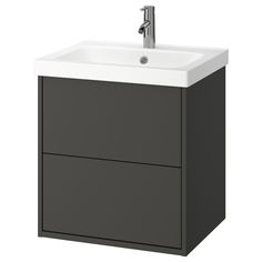 a bathroom vanity with a sink and faucet on it's side, against a white background