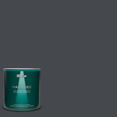 a can of marjoiee paint on a gray background