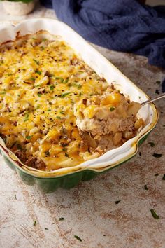 a casserole dish filled with meat and cheese