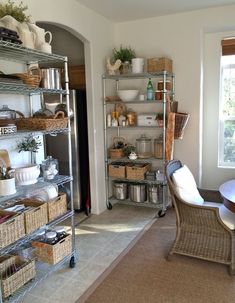 a room filled with lots of shelves and baskets on top of it's sides