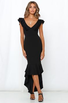 Length from shoulder to hem of size S: 118cm - 125cm. (Hi-low hemline) Black dress. Lined. Cold hand wash only. Model is a standard XS and is wearing XS. True to size. Stretchy mid-weight woven crepe fabric. Invisible back zipper. Polyester/spandex. Gurrrl make some drama in this show stopping number! The Hills Maxi Dress features a hi-low ruffle hem, invisible back zipper, tubular crossover detailing on the back and a feminine v-neckline. We love wearing ours with a smokey eye, bold clutch and Winter Semi Formal Dresses, Black Tie Wedding Guest Dress, Black Dresses Classy, Black Tie Wedding Guests, Black Ruffle Dress, Guest Attire, Semi Formal Dresses, Wedding Attire Guest, Maxi Dress Black