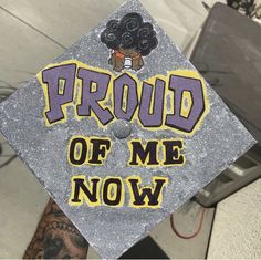 a graduation cap that says proud of me now