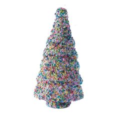 a small christmas tree made out of sprinkles on a white background in the shape of a cone