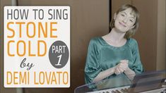 a woman standing in front of a piano with the words how to sing stone cold part 1 by demi lovato