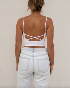 ~ 72% Modal 24% Nylon 4% Spandex ~ Seamless ~ Open back criss cross straps ~ Model is 5'9" wearing a size S/M Fitted Crisscross Top With Built-in Bra, Fitted Crisscross Crop Top With Built-in Bra, Strappy 4-way Stretch Sports Bra, High Stretch Strappy Sports Bra, Fitted Tank Top With Built-in Bra And Cross Back, Fitted Tank Top With Built-in Bra And Strappy Back, High Stretch Strappy Back Sports Bra, Stretch Cross Back Sports Bra With Straps, High Stretch Sports Bra With Strappy Back