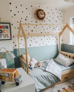 a child's bedroom with a bed and toys