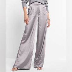 Express: Stunning High Waisted Wide Leg Trousers In Luxurious Satin Fabric Featuring Hidden Hook And Zip Closure, Functional Slanted Hand Pockets, Back Pockets, And Pleated Detailing In A Beautiful Pewter Silver Gray. The Perfect Staple Piece To Add To Your Wardrobe For A Timeless Chic Look For Any Occasion. (Size: 14r) *Nwt* Inseam: 32.5" Matching Blazer (Available In My Closet) Wide Leg Pant, Wide Leg, High Waisted, Satin, Grey, Pants, Trousers