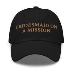 the bridesmaid on a mission hat is black with gold embroidered on the front