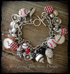 a baseball charm bracelet with charms on it