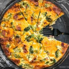 broccoli and ham quiche with a slice missing