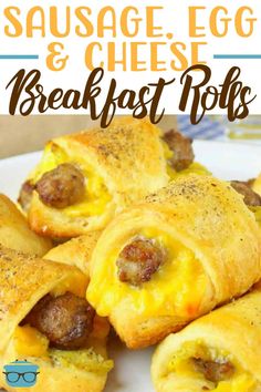 sausage egg and cheese breakfast rolls on a plate