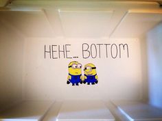 the inside of a refrigerator with an image of two minion cartoon characters on it