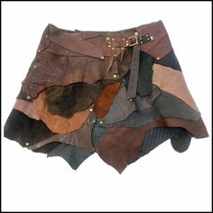 I want to offer a skirt that is dynamic and lively and has a wide range of brown tones. Indispensable for festivals, viking, burning man festival, barbarian costume. First of all, the material of all our products; Vegetable tanned genuine leather, stainless metal accessory, does not tarnish. It is prepared in a single piece and in US size M-2XL range. The 15 cm adjustable belt is always suitable for use during body changes. There are extra closure snaps on the inside to ensure user comfort. The average length of the skirt is 35 cm. The product is sent in a gift package decorated with seasonal flowers. SHIPPING: All our cargoes are express by UPS,DHL or Fedex Shipping takes average 4-7 business days for European countries; 7-10 business days US and Canada. Returns and exchanges: I gladly ac Barbarian Woman Costume, Barbarian Outfit, Brown Mini Skirt For Festival, Viking Skirt, Female Viking Costume, Vikings Costume, Viking Leather Skirt, Fitted Bohemian Brown Mini Skirt, Barbarian Costume