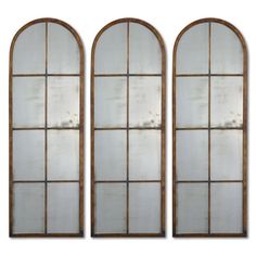 three arched windows are shown against a white background