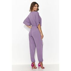 Elegant women's jumpsuit available in eight fashionable colors. Its cut perfectly emphasizes the female figure, combining elegance with comfortable wear. The loose sleeve reaching to the elbow fold line ensures freedom of movement. The suit is exceptionally sensual thanks to the heart-shaped neckline, which not only emphasizes the bust, but also optically lengthens the neck. Long legs finished with a practical drawstring add style and make the suit look great with different footwear. The material is flowing and pleasant to the touch, at the same time guaranteeing wearing comfort. This is an ideal choice for women who appreciate fashion, but do not sacrifice comfort. Spandex 6 % Polyester 94 % Size Lenght Hips Chest Waist 36/38 136 cm 100 cm 108 cm 100 cm 40/42 138 cm 108 cm 116 cm 108 cm 4 Chic Solid Color Overalls Jumpsuit, Chic Stretch Jumpsuits And Rompers For Loungewear, Elegant Loungewear Overalls And Jumpsuits, Chic Overalls With Solid Color, Casual Jumpsuits And Rompers For Spring Evening, Chic Long Sleeve Relaxed Fit Jumpsuits And Rompers, Chic Solid Color Jumpsuits And Rompers For Loungewear, Trendy Relaxed Fit V-neck Jumpsuits And Rompers, Trendy Solid Color Evening Jumpsuits And Rompers