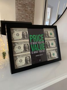 a framed poster with words on it that says price is what you pay value is what you get