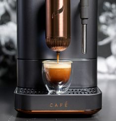 an espresso machine is being filled with coffee