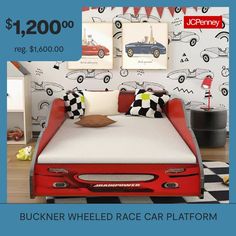 a red bed with white sheets and black and white checkered pillows on it in front of a racing car wallpaper