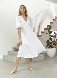 The Charlotte Dress (linen) is made from 100% linen and features balloon sleeves with a front panel to add width and give the dress a full hem. Linen:- White- Black- SandCotton:- Olive Check- Jade GinghamCare Instructions:Cold gentle machine wash. Do not tumble dry.As all items are made to order we require 5-7 business days for production.All packages are shipped with EXPRESS POST, and are delivered by DHL worldwide. Delivery is guaranteed within 1 week of shipment. Casual Puff Sleeve Linen Dress, Spring Linen Dress With Gathered Sleeves For Daywear, Linen Puff Sleeve Dress For Brunch In Summer, Casual Summer Linen Dress With Gathered Sleeves, Casual Linen Dress For Brunch, White Relaxed Fit Dress With Puff Sleeves, Spring Linen Dress With Gathered Sleeves, Casual Linen Dress With Gathered Sleeves, Spring Linen Puff Sleeve Dress