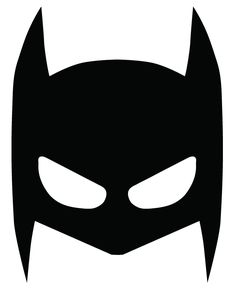 the batman symbol is shown in black and white, with eyes glowing from behind it