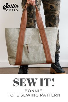 the sew it tote sewing pattern is shown in front of a woman's legs