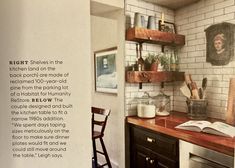 an open book sitting on top of a kitchen counter next to a wooden table and chairs