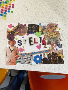 the name stella is surrounded by pictures and stickers on a table with plastic chairs