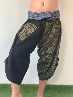 "* This is a unique product. The pants shown in the photo are the only pair in the world and will be sent to the buyer. These special design harem pants have fisherman pants style wrap around waist and belt, totally unlike anything before them. The main fabric is made from pre-washed soft cotton with subtle texture. The fold over waist is made from vintage handmade fabric brought from hill tribes in northern Thailand, so they are totally unique. There is one side pocket for your essentials. The Traditional Black Harem Pants For Yoga, Traditional Wide Leg Parachute Pants For Festivals, Traditional Wide-leg Parachute Pants For Festival, Traditional Harem Pants With Pockets For Festivals, Traditional Black Harem Pants For Festival, Traditional Black Harem Pants, Black Hippie Harem Pants For Festival, Traditional Black Harem Pants With Pockets, Samurai Pants