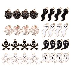 halloween charms with black and white designs on them