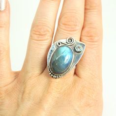 Gorgeous .925 Sterling Silver Canadian Labradorite & Blue Topaz Ring Size 8 New Without Tags Sterling Silver Freeform Rings As Gifts, Unique Blue Moonstone Ring With Natural Stones, Blue Labradorite Jewelry With Large Stone, Unique Blue Gemstones For Anniversary, Unique Blue Moonstone Ring Gift, Blue Oval Moonstone Ring, Unique Blue Gemstones In Sterling Silver, Blue Labradorite Moonstone Ring, One Of A Kind Blue Sterling Silver Rings