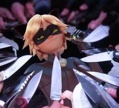 an animated character holding two knives in front of other characters