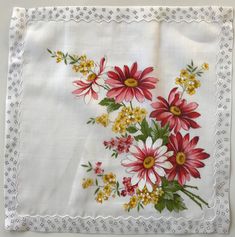 A vintage hanky with red and white daisies is a breath of summer. It is printed with bold red and white daisies and sprigs of yellow forget-me-nots on a cotton fabric. The borders of this vintage handkerchief is doubled and secured with a sewn scalloped line. The hem is scattered with simple flowers in black on this vintage summer like hankie. The label is still affixed so it hasn't been used. The vintage hankie measures 14 1/2 inches square. Vintage Handkerchiefs For Spring Gift, Vintage Cotton Handkerchiefs With Floral Print, Vintage Cotton Handkerchiefs For Spring, Spring Cotton Handkerchiefs With Floral Embroidery, Vintage Floral Print Cotton Handkerchiefs, Vintage White Handkerchiefs For Spring, Vintage White Floral Print Handkerchiefs, Vintage Flower Shaped Handkerchiefs For Spring, Vintage Flower Handkerchiefs For Spring