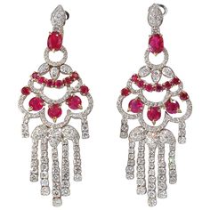 Chandelier Statement Ruby Diamonds Dangling throughout 6.20ct. Natural Red Rubies. Rubies: Rounds & Oval, Full Cuts. Transparent, clean clarity & even red tone. 5.00cts of round diamonds: G-color, Vs-2 clarity. 18kt. white gold 30 grams. Earrings measure 1.02 inch Diameter 2.7 inch long Comfortable omega closure $26,000 Appraisal Certificate to accompany Dangling Chandelier, Pearl Earrings Dangle, Ruby Diamond, Antique Earrings, Red Ruby, Lovely Jewellery, Natural Red, Chandelier Earrings, Amazing Jewelry