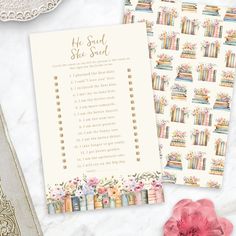 two books are next to each other on a table with flowers and lace doily