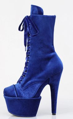 This Adore-1045 style is designed in velvet material and comes in a stunning shade of navy blue. Don't just look hot, be hot by walking tall and feeling fierce in these babies. 7" (178mm) Heel 2 3/4" (70mm) Platform Lace-Up Front Ankle Boot Inner Side Zip Closure Refer to the sizing chart for US women's sizing. Blue High Heel Platform Boots For Party, Blue High Ankle Heels For Party, Blue Platform Boots For Party, Blue High-top Platform Boots, Blue Closed Toe Party Boots, Party Blue Closed Toe Boots, Blue Closed Toe Boots For Party, Fitted Blue Closed Toe Boots, Blue Round Toe Platform Boots For Winter