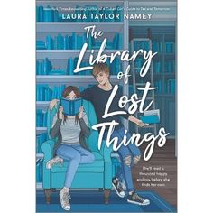 the library of lost things book cover with two people sitting on a blue chair in front of bookshelves