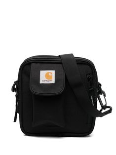 Essentials logo patch messenger bag from CARHARTT WIP featuring black, logo patch to the front, adjustable shoulder strap, top zip fastening and main compartment. Carhartt Wip Essentials Bag, Carhartt Bag, Wip Bag, Carhartt Logo, Streetwear Accessories, Chloe Purses, Carhartt Work In Progress, Linnet, Across Body Bag