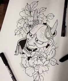 an ink drawing of a bull with flowers on it's head and horns around its neck